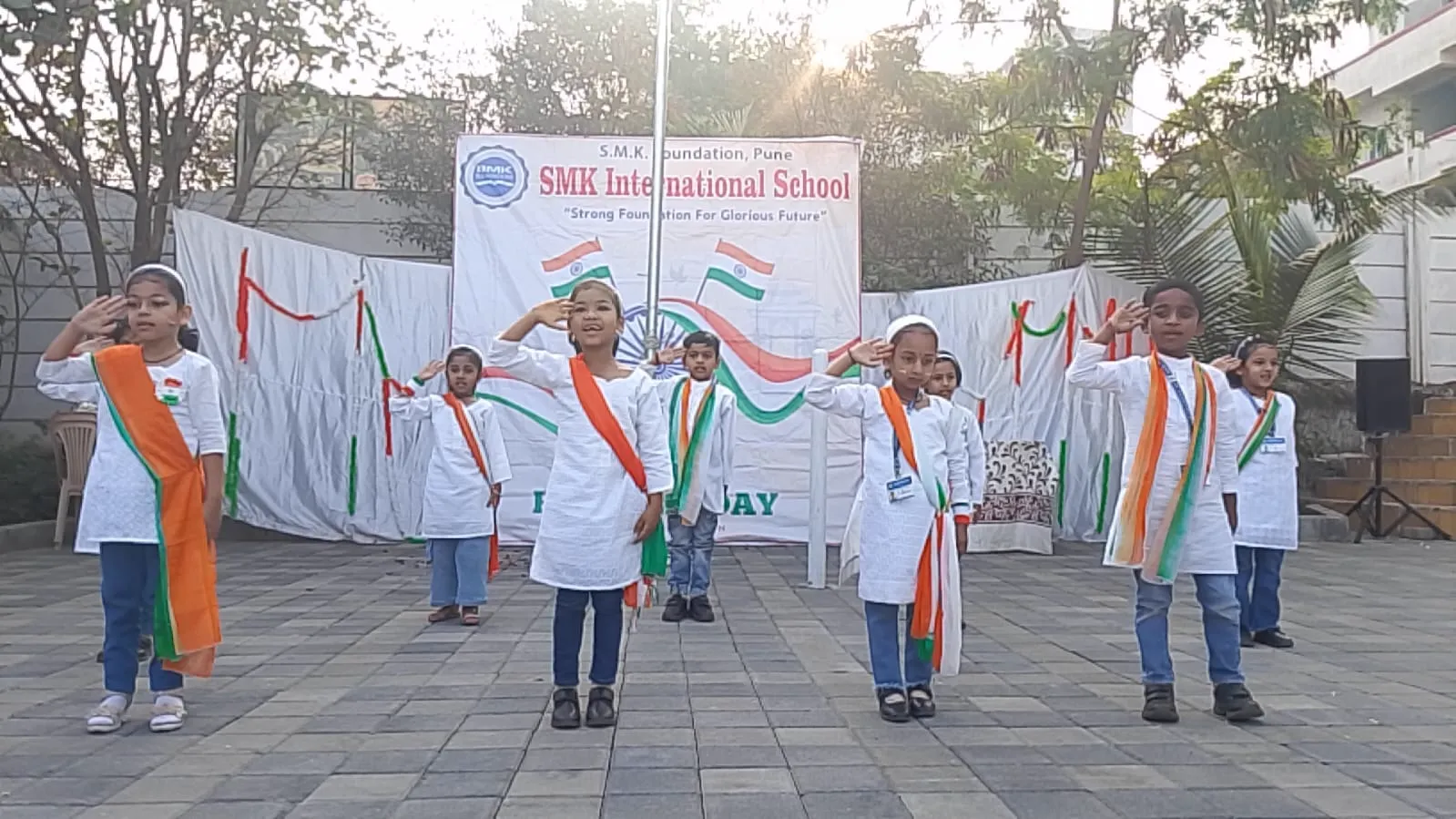 Students participating in Republic Day celebrations with patriotic performances.